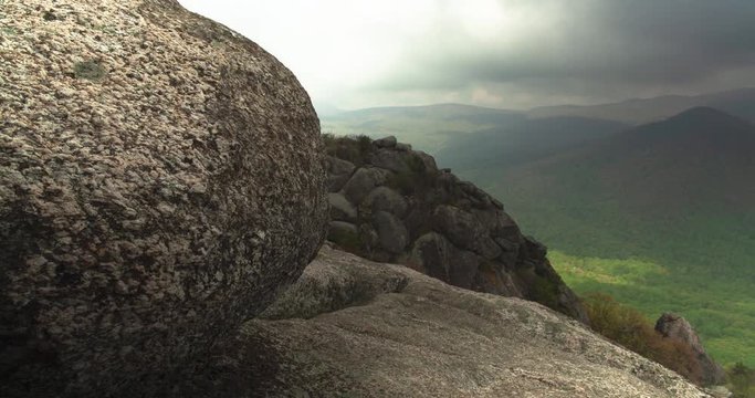 A time lapse from the summit of Old Rag Mountain. The camera pans from a large boulder to Robertson Mountain.
