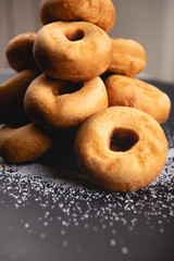 sugar in donut on black background