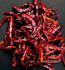  dried chilli on a black background