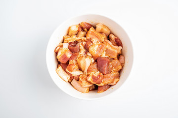 a bowl of marinated pork belly
