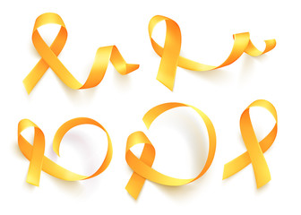 Realistic yellow ribbon. World childhood cancer awareness symbol, vector illustration.