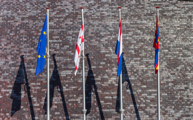 Flags at the facade of the Coevorden town hall