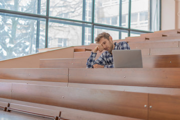 tired from study student sleep in lecture hall b