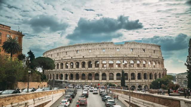 Rome, Italy. Colosseum. Traffic Near Flavian Amphitheatre. Famous World Landmark. UNESCO