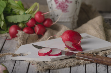 Bio radishes cuttting on wood table