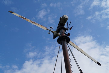 windmill against blue sky