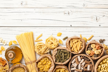 Assortment of pasta on a wooden table
