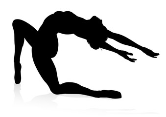 Ballet dancer in silhouette dancing in pose or position © Christos Georghiou