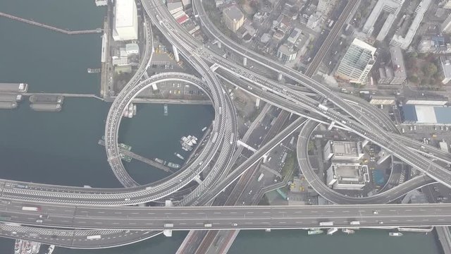 Top view zoom out over the highway, expressway and highway, Aerial view interchange of Osaka City, Osaka, Kansai, Japan