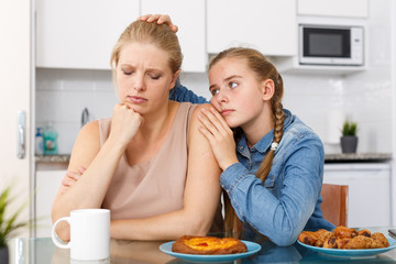 Girl asking for forgiveness from her mother