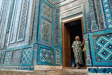 Woman Travaler on East Asia Mosque Vault Backdrop - obrazy, fototapety, plakaty