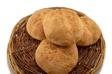 Fresh baked homemade bread in a wicker wood basket