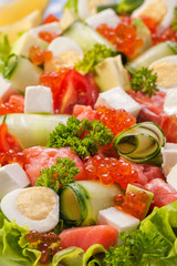 vegetable salad with eggs, cheese and caviar background