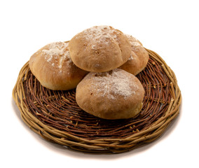 Fresh baked homemade bread in a wicker wood basket