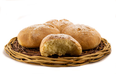 Fresh baked homemade bread in a wicker wood basket