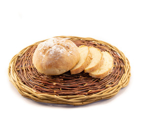 Fresh baked homemade bread in a wicker wood basket