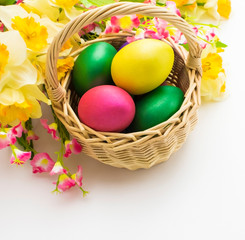 Fototapeta na wymiar Easter background with easter eggs. Painted Easter eggs. Easter flowers. Easter holiday