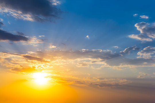 beautiful sparkle natural background, dramatic sunset over a cloudy sky © Yuriy Kulik