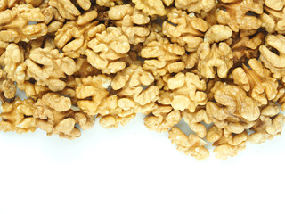Walnuts as a background and texture on a white background