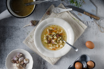 Smoked meat soup with pasta inside