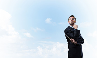 Inspiration of young creative businessman