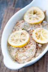 Baked fish fillet in butter and lemon sauce