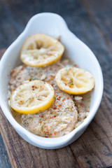 Baked fish fillet in butter and lemon sauce