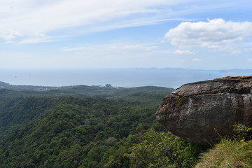 Fototapeta na wymiar Panorama view with a big rock over Krabi at the jungle hiking trail to dragon crest in Khao Ngon Nak in Krabi, Thailand, Asia