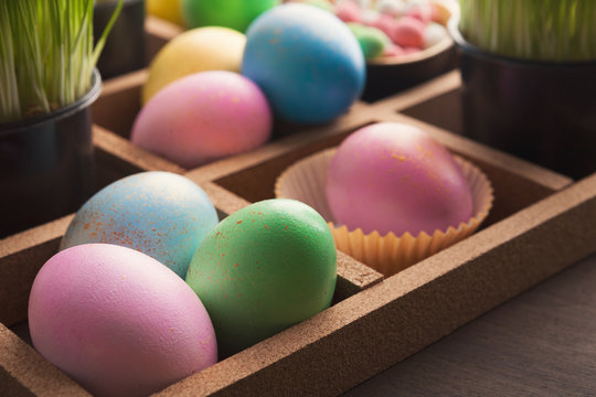 Easter eggs in wooden container
