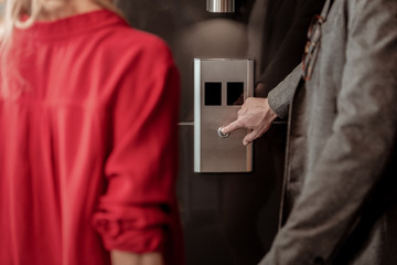 Obraz premium Close up of male hand that touching button