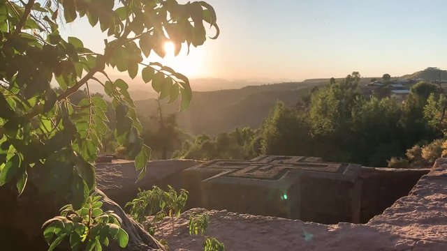 The rock-hewn monolithic Church of St. George at Lalibela as sun sets December 2018, tc01
