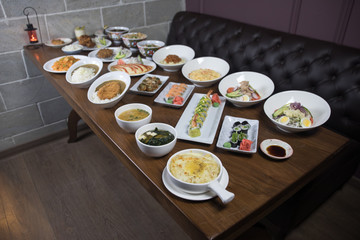 Close up view of plate with japanese food inside. Japan traditional food on wooden table.