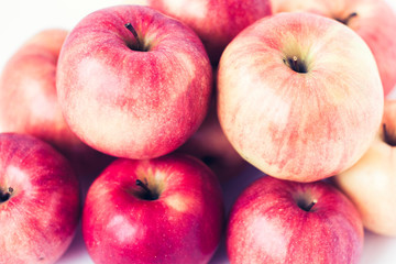Fresh ripe red apples on white background, vegetarian concept.