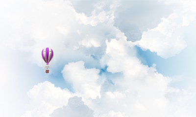 Obraz premium Flying hot air balloon in the air.