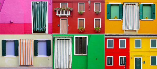 Colorful buildings in Burano island sunny street , Italy
