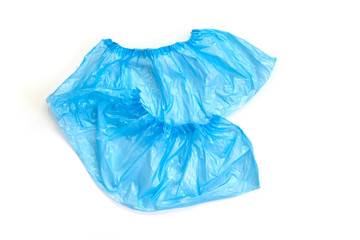 Fototapeta premium Hygiene and cleanliness in medical institutions. Blue medical shoe covers.