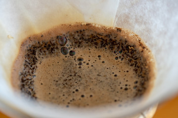 brewing coffee in a chemex closeup filter