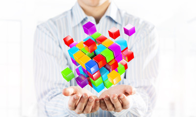 Concept of technology integration and innovation presented by cube figure. Mixed media