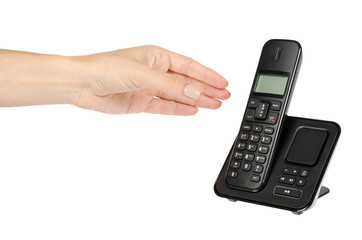 modern landline cordless phone with hand, old technology concept.