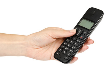 modern landline cordless phone with hand, old technology concept.