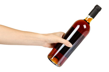 closed bottle of wine with hand, alcohol and addiction concept
