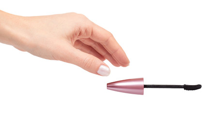 Hand with cosmetic black brush mascara, beauty product