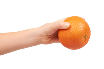 Kids hand with fresh orange tangerine, raw citrus fruit