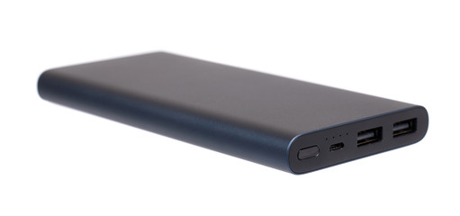 Dark blue power bank for charging mobile devices, external battery.