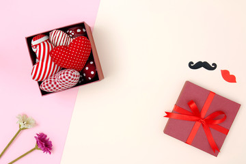 Flat lay of red pillows heart in gift box with copy space. Love and Valentine's day concept. Minimal style.