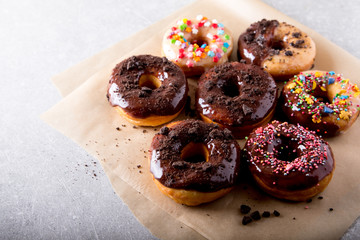 Pastries concept. Donuts with chocolate glaze and chocolate cookies