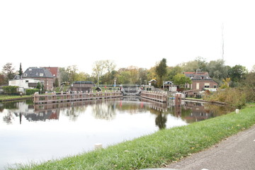Fototapeta premium Sluice in the river Hollandsche IJssel named goejanverwellesluis in Gouda where tides in river stops