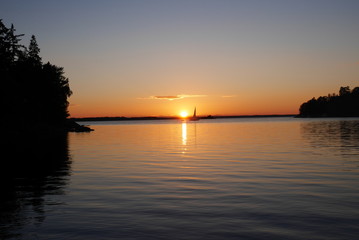 Fototapeta na wymiar sunset mit Boot
