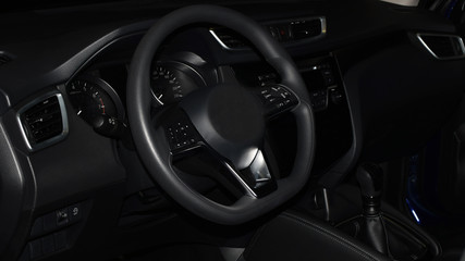Stylish dark image of modern car interior.