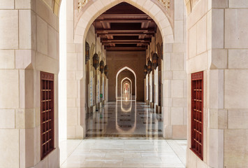 Deserted arched passageway at the Sultan Qaboos Grand Mosque